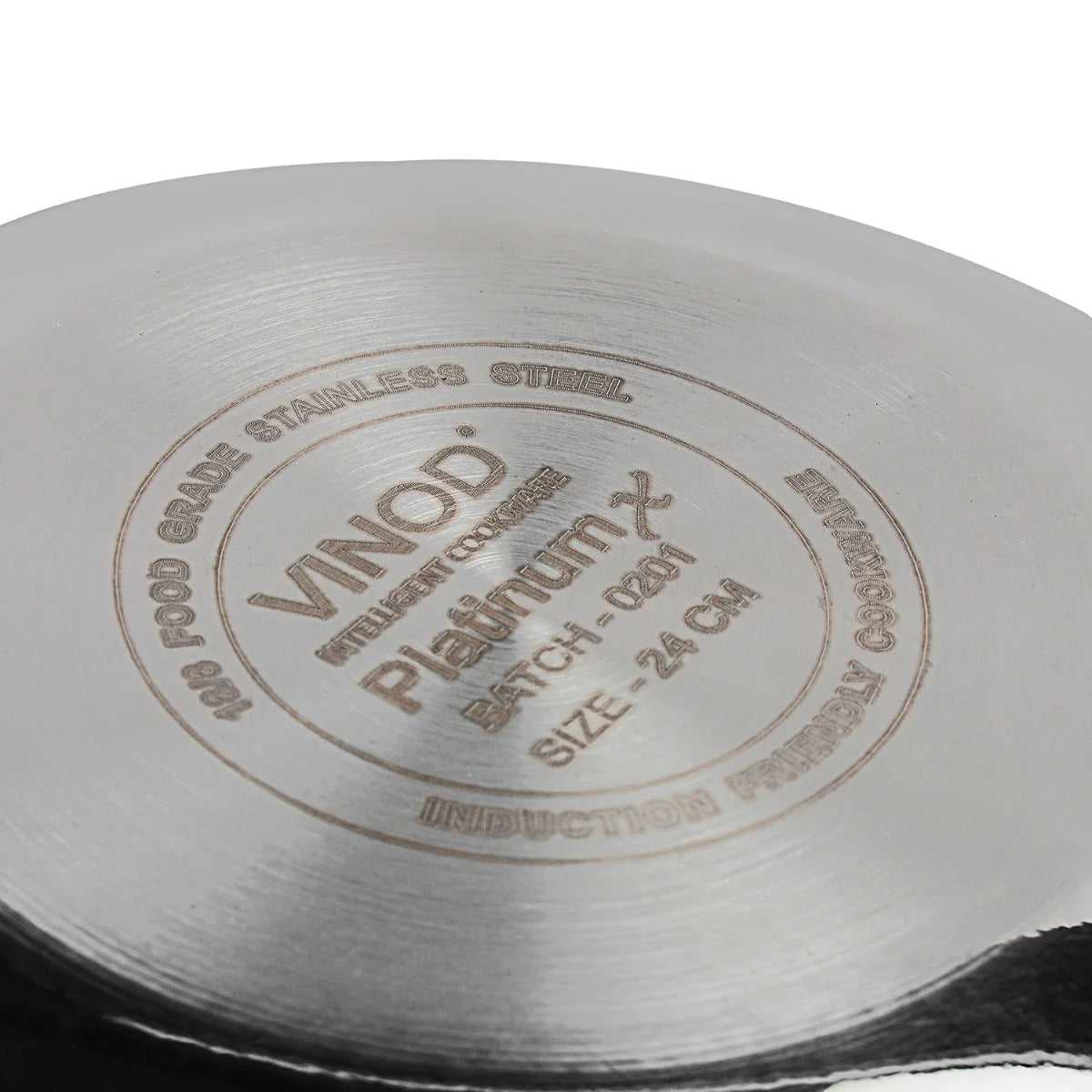 A close-up of the induction-friendly base of the 24cm Vinod PlatinumX Kadai, clearly etched with details confirming its 18/8 food-grade stainless steel material