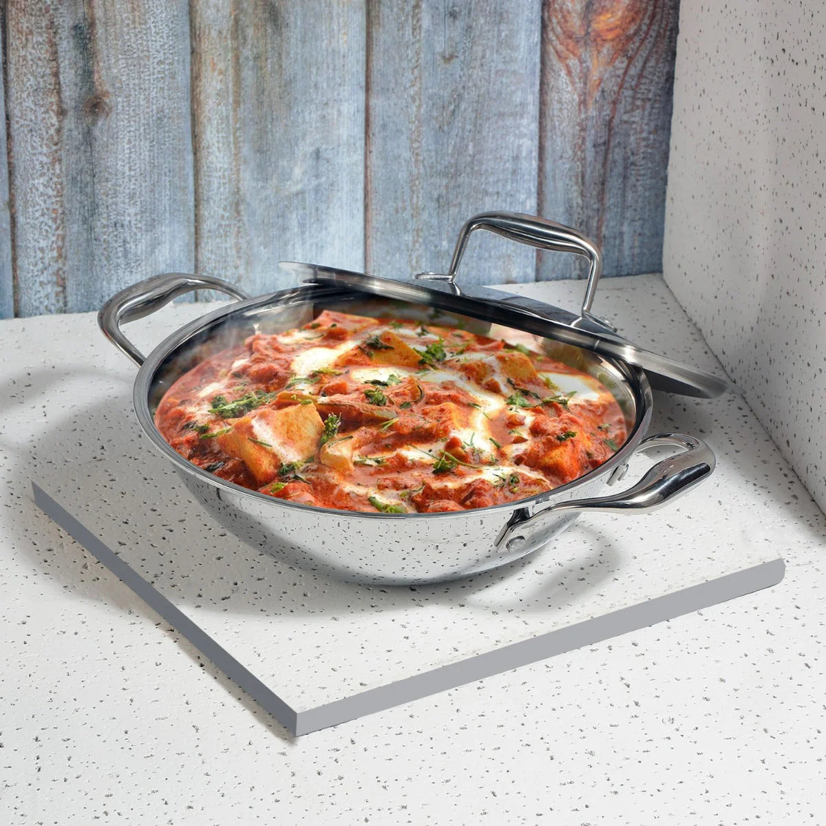Rich paneer curry cooked evenly in a Vinod Platinum SAS Pro non-stick kadai, ideal for modern induction kitchens